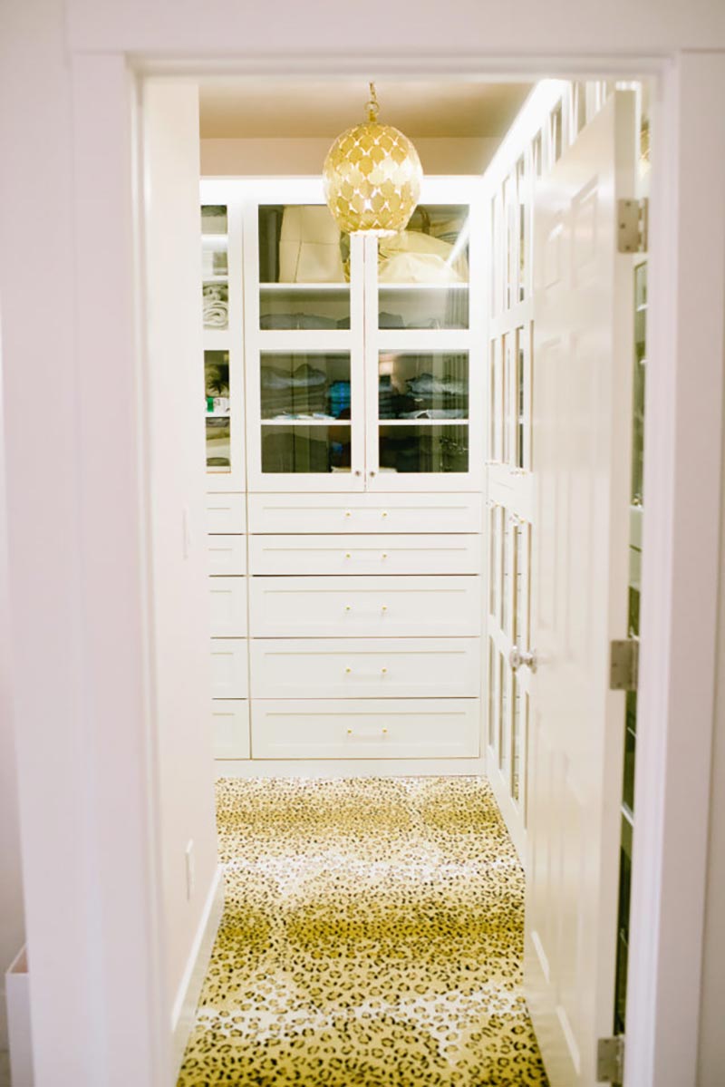 glam closet with leopard carpet