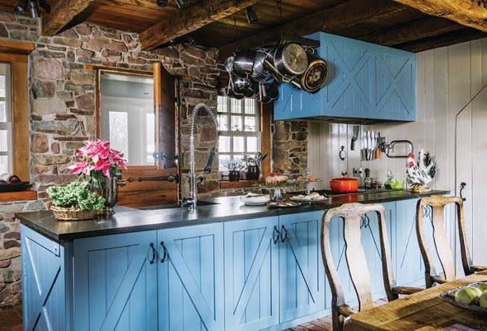 Rustic kitchen with blue island
