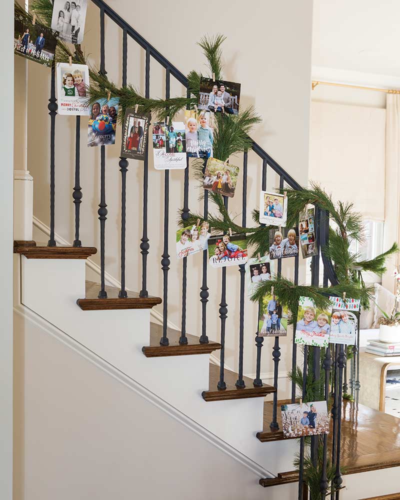 staircase with garland and Christmas cards