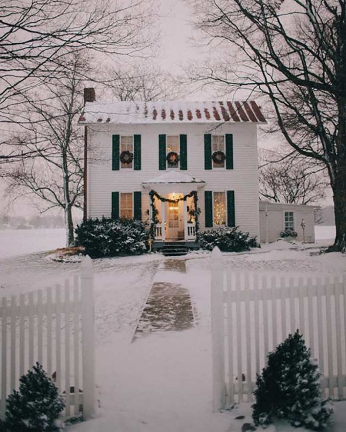 white cottage in the snow