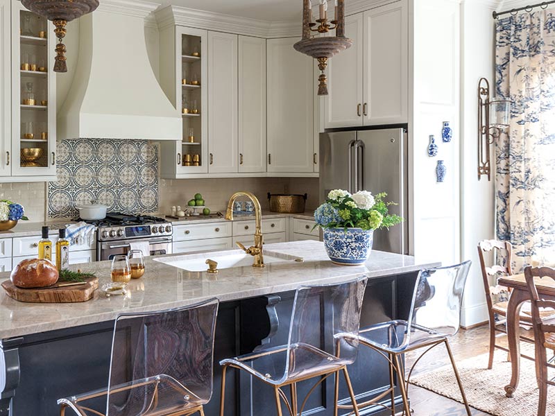 Classic white and blue kitchen with Italian tile backsplash