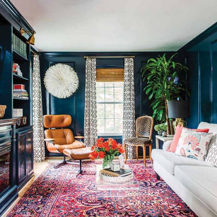 peacock-blue walls in eclectic living room
