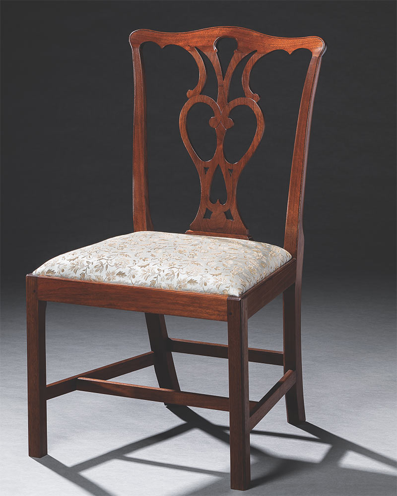 Reproduction of an 18th-century Portsmouth, New Hampshire, chair crafted in walnut.