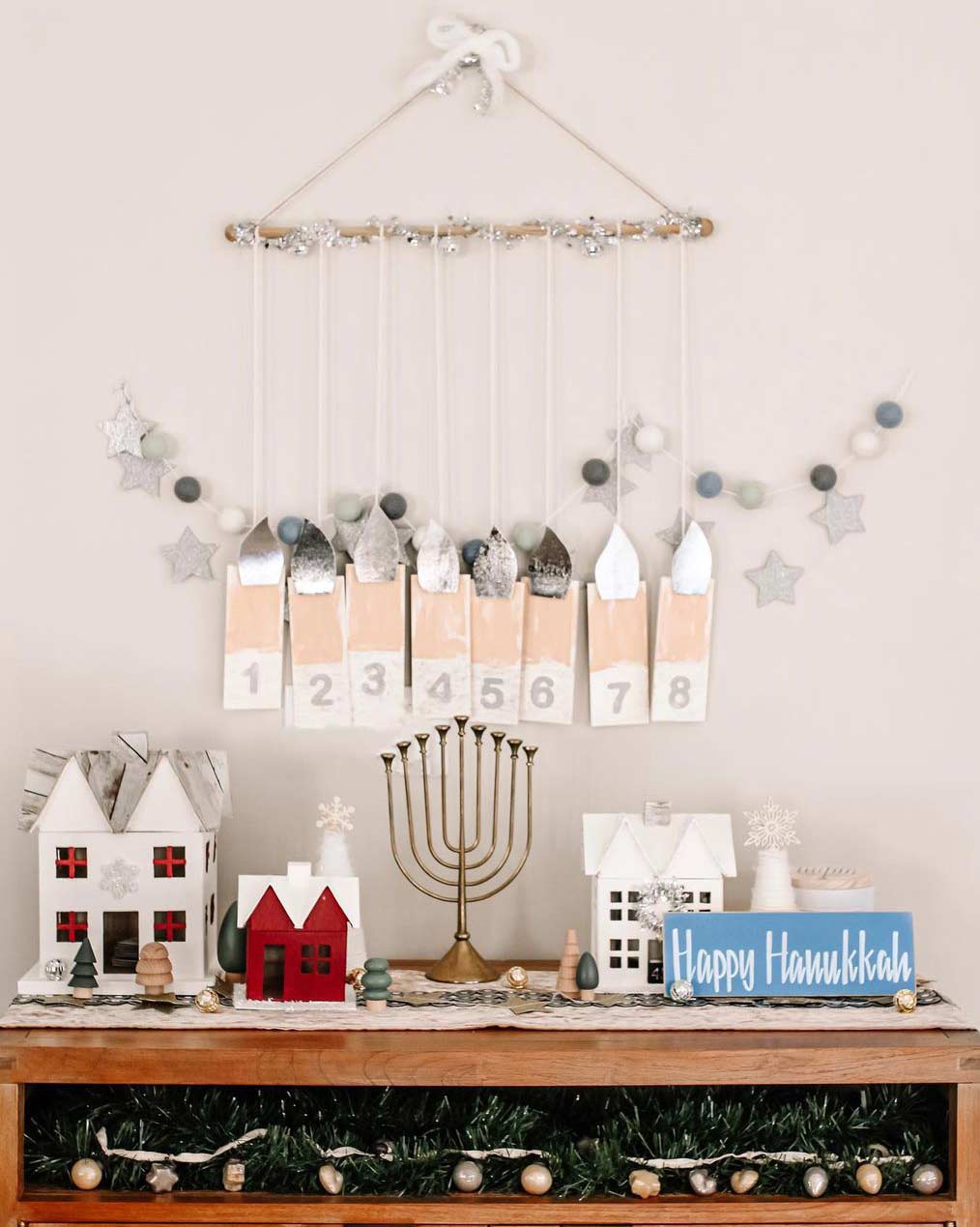 A wall-mounted calendar designed to look like a menorah. 