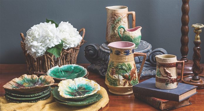 A tabletop vignette with Majolica pottery.