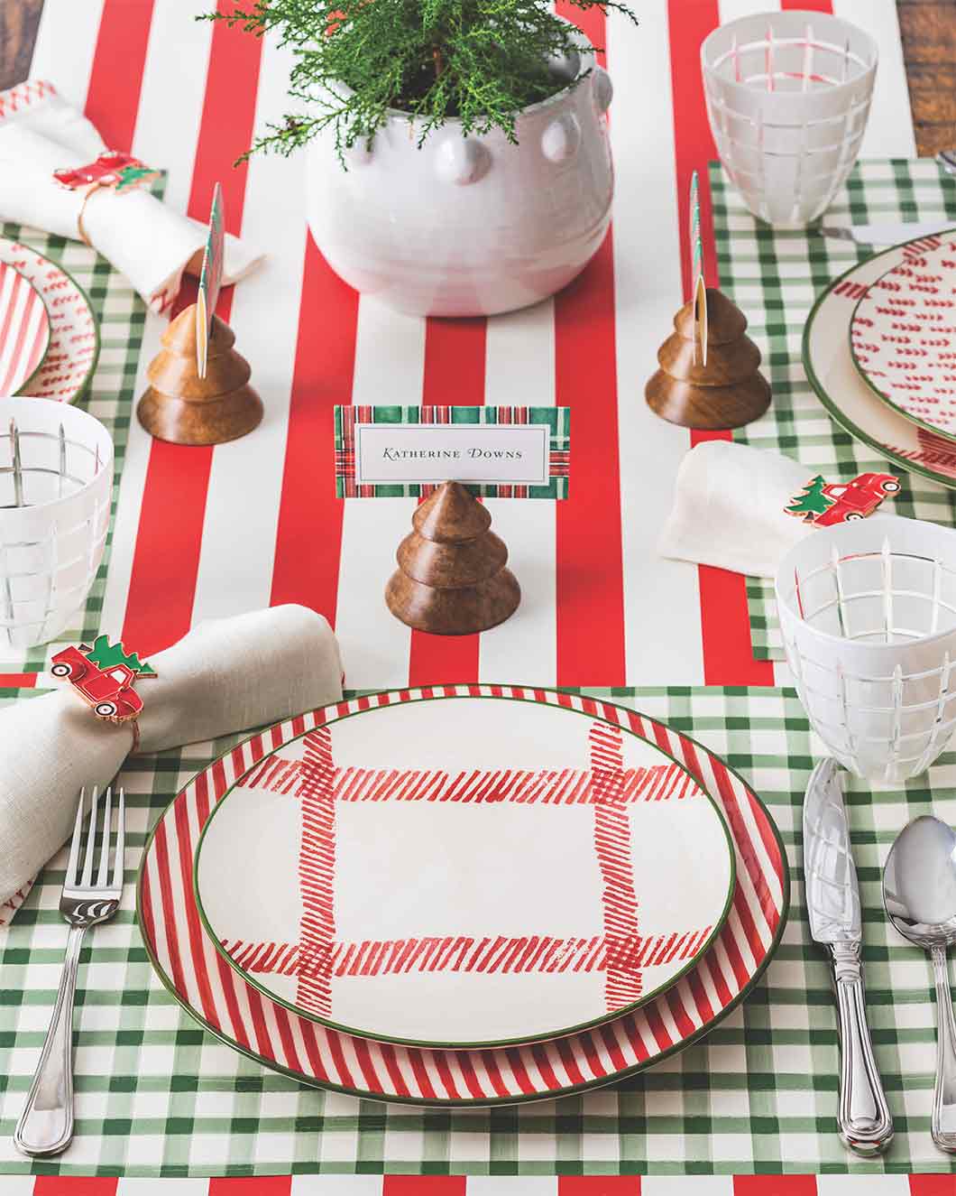 A holiday tablescape with red and green accents. 