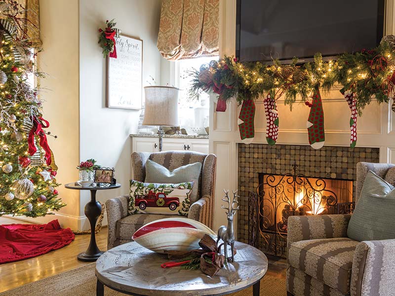A fireplace with stockings in a casual family room. 