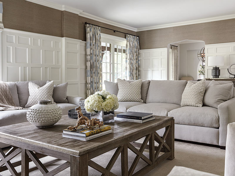 A living room with white furnishings.