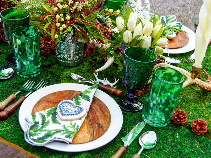 A tablescape with green glassware.