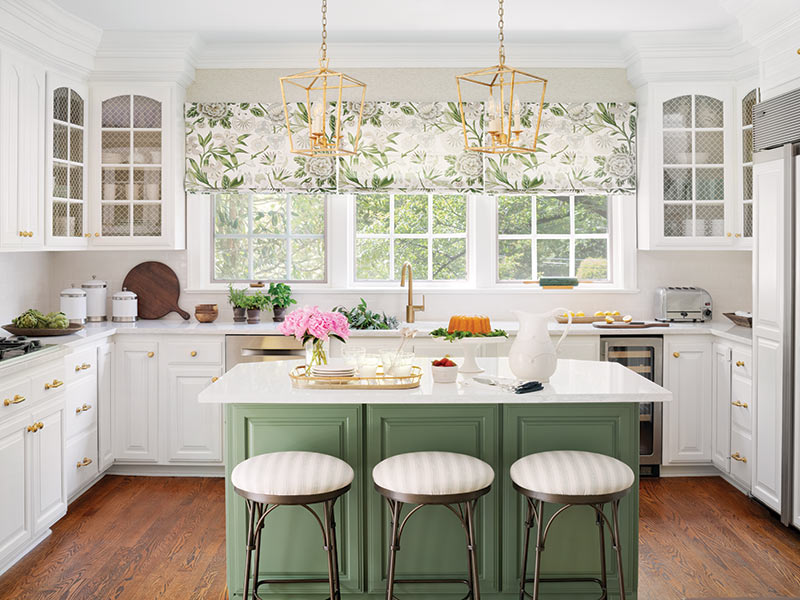 A white and sage kitchen.