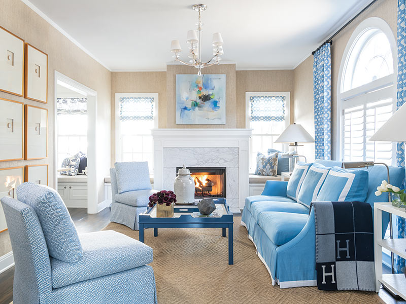 A living room decorated in blue and white.
