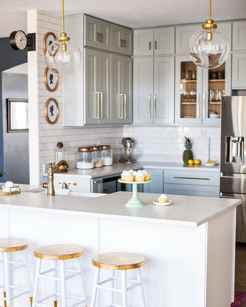 A white kitchen with vintage and contemporary accents.