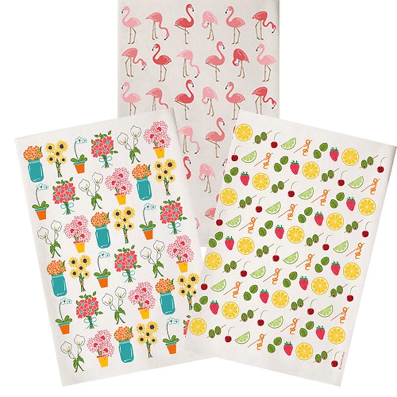 Three tea towels with colorful designs.