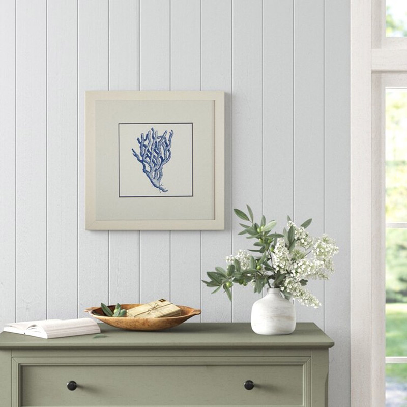 A framed drawing of blue coral.