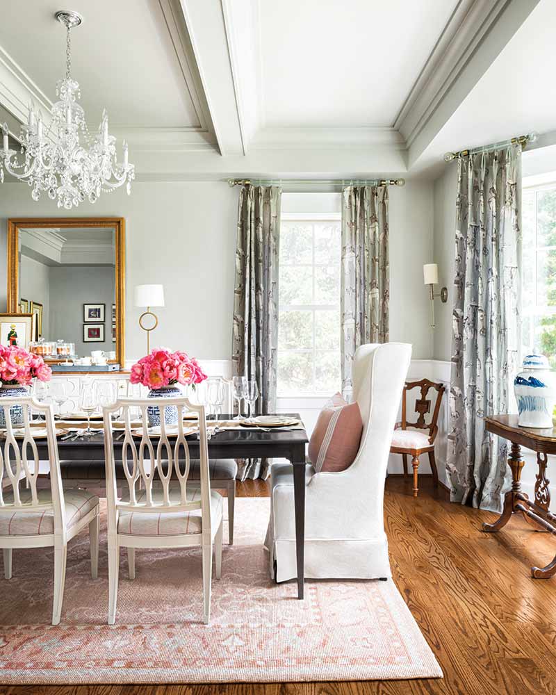 A dining room with a muted pastel palette. 